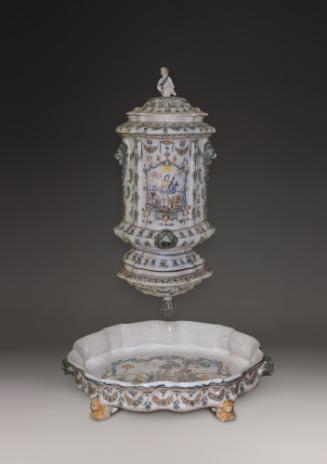 Wall fountain and basin painted with figurative scenes and ornate decoration in color