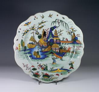 Circular plate with an oriental landscape in color