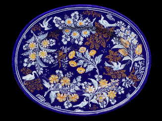 Oval platter with a deep blue background and floral decoration