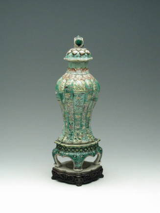 Green porcelain jar with floral and vegetal designs