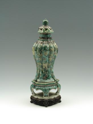 Green porcelain jar with floral and vegetal designs