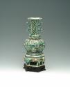 Green porcelain jar with handles and floral and vegetal designs