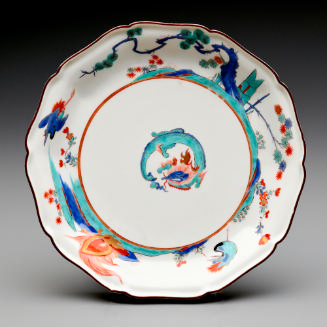 ten-sided dish with dragons in a landscape