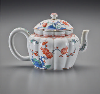 faceted teapot with asian-style decoration