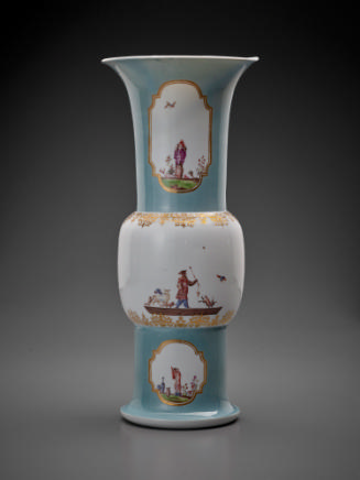 tall light blue vase with white areas