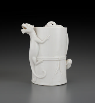 Cylindrical white teapot with dragon spout