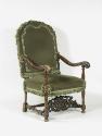 Photograph of a green armchair