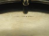 Close-up photograph of engraving on silver bowl