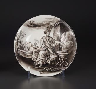 Saucer with a figure at the center and landscape inthe background