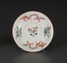 Saucer with painted floral motif