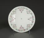 Saucer with painted decorative motif