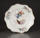 Plate with painted mushrooms and floral decoration