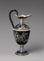 Side view of black painted enamel ewer
