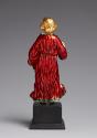 Back view of small enamel sculpture of the Christ child in a blessing