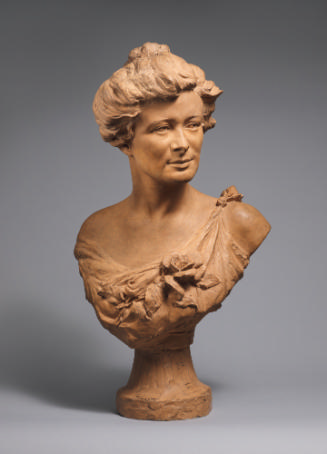 Terracotta bust of a young woman in three-quarter view facing right