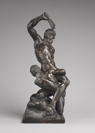 A bronze sculpture of Samson and two Philistines.  Samson is the main figure, his head is turne…