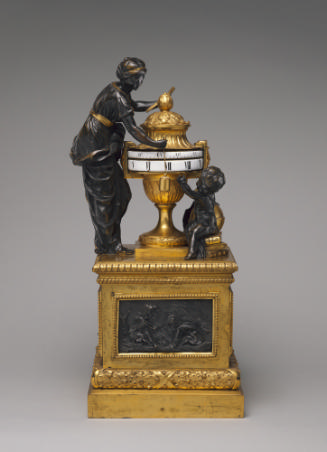 Annular mantel clock in gilt bronze with two patinated bronze figures