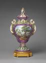 View of pot-pourri vessel in purple and green with landscape scene