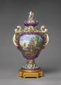 Porcelain pot-pourri vessel in purple and green with landscape scene