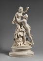 A marble sculpture of Fidelity crowning Love.  Love looks up at Fidelity who is elevated a bit …