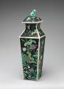 Alternate view of porcelain square covered vase with black ground and floral and vegetal design…