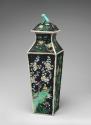 Alternate view of porcelain square covered vase with black ground and floral and vegetal design…