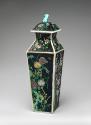 Alternate view of porcelain square covered vase with black ground and floral and vegetal design…