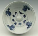 Blue and white porcelain bowl, view of interior of bowl with figures and decoration.