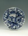 Blue and white porcelain deep plate with two figures in a landscape.