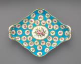 Porcelain lozenge-shaped tray with roses on turquoise blue ground