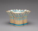 Porcelain basket-shaped dish in blue, white, and gold