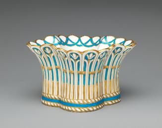 Porcelain basket-shaped dish in blue, white, and gold