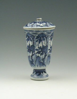 Blue and white porcelain beaker and cover.