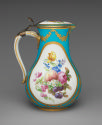 Alternate view of porcelain water jug in blue, white, and gold with images of flowers