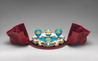 Porcelain inkstand in blue and gold in open red case