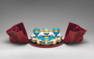 Porcelain inkstand in blue and gold in open red case
