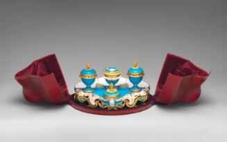 Porcelain inkstand in blue and gold in open red case