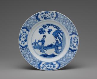 Blue and white porcelain plate with two standing women
