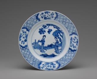 Blue and white porcelain plate with two standing women