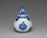 Alternate view of blue and white porcelain covered jar with plant design