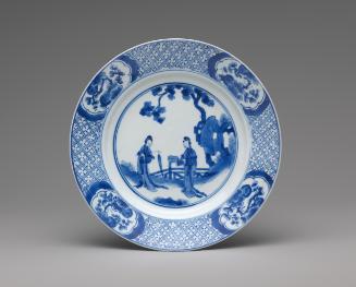 Blue and white porcelain plate with two standing women