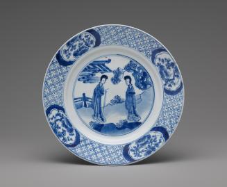 Blue and white porcelain plate with two standing women