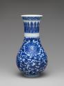Alternate view of blue and white porcelain beaker with floral decoration
