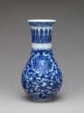 Alternate view of blue and white porcelain beaker with floral decoration