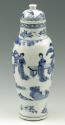 Blue and white porcelain covered jar with figures in a landcape. 