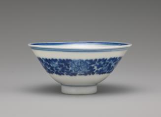 White hard-paste porcelain wine cup with underglaze blue decoration