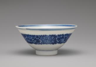 White hard-paste porcelain wine cup with underglaze blue decoration