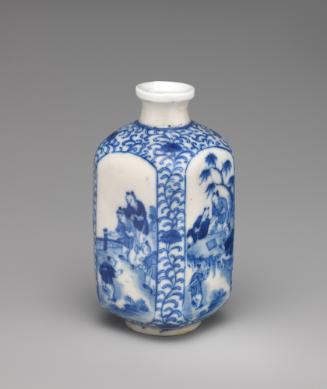 White and blue soft-paste porcelain vase with figural decoration