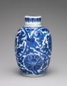 Alternate view of white hard-paste porcelain jar with cylindrical lid with underglaze blue deco…