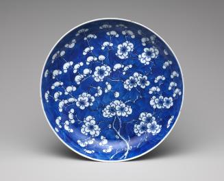 White hard-paste porcelain dish with plum-blossom underglaze blue decoration